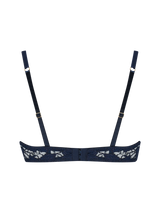 A deep blue quarter cup bra with intricate embroidery along the edges and adjustable straps.