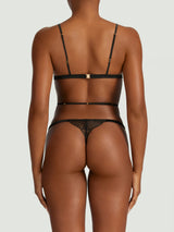 An open playsuit with soft cups in Coco de Mer's stunning Athena embroidery, designed to flatter the body as shown on model