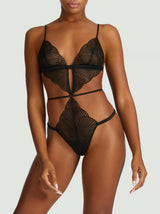 An open playsuit with soft cups in Coco de Mer's stunning Athena embroidery, designed to flatter the body as shown on model