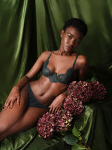 Isara Brazilian knicker in deep green lace with scalloped edges that graze over the cheeks, paired with Isara plunge bra as shown on the model.
