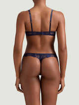 Arella Half Cup Bra and Skirted Thong in delicate blue floral embroidery with scalloped edges, shown on model as the perfect pair