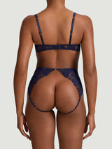 Coco de Mer Arella Quarter Cup Bra paired with Arella High Waisted Open Knicker in a deep blue floral embroidery with fully adjustable straps around the cheeks