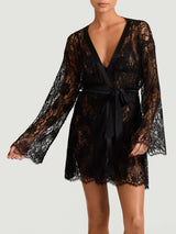 A black Leaver's lace robe with scalloped hem and sleeves, featuring a jet black silk tie, as shown on model