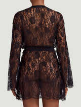 A black Leaver's lace robe with scalloped hem and sleeves, featuring a jet black silk tie, as shown on model