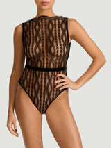 A black scalloped Leaver's lace bodysuit with a boat neckline, eyelash trim, and velvet buttons down the spine, designed in London and made in Portugal.