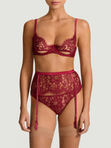 Kiana Balcony Bra, Brazilian Knicker and Suspender Belt with red lurex Leaver's lace in a floral design, scalloped eyelash trim and adjustable silk straps, as shown on model