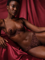 Tamia Quarter Cup and Open Knicker set in mocha-colored bespoke embroidery and silk bound strapping, featuring scalloped edges, shown on model