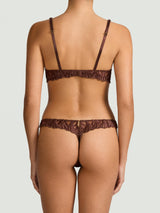 Tamia Balcony Bra paired with Tamia Skirted Thong in mocha-colored bespoke embroidery and silk bound strapping, featuring a scalloped edge