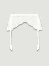 Front cut out image of the ivory suspender belt, showing scallop edge embroidery, attached to ivory silk adjustable straps