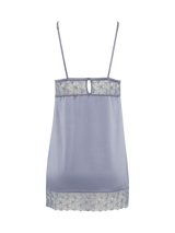 Back view of the Coco de Mer Esme slip. Powder blue silk and sheer geometric floral embroidery.