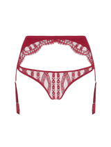 An intricate red French Leaver's lace and luxurious silk suspender knicker with a high waist and adjustable straps, featuring golden hardware and scallop edge lace details.