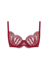 A red plunge bra made from a delicate French leaver's lace and silk. Scallop edges run across the neckline edge of the cups and at the under band. It is finished with red silk wire casing, adjustable straps and a hook and eye closure.