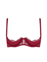 A red quarter cup bra featuring details of scallop edged Leaver's Lace lining a silk covered quarter cup and silk straps with a hook and eye closure at the spine.