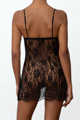 A black, French Leaver's lace slip dress with triangle cups, delicate eyelash edging, and silk straps
