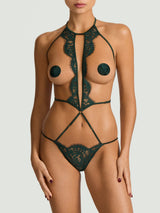 An open playsuit in forest green featuring delicate lace and silk straps, featuring an open design for the breasts and the bum, with matching nipple covers that are available in shop only.