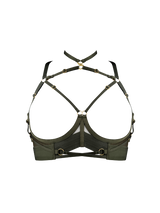 Front cut out image of olive green multiway bra showing exposed chest area with gold sliders attached to adjustable harness straps following from the chest area up across the collar bone area and up to the neck, thick bodice strap with gold ring detailing across the front of the under band