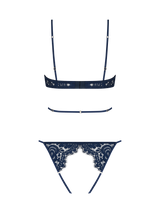 Model wears a UK size M in wired open playsuit from the back, showing exposed bottom with scallop edge sapphire lace detailing across the back and silk straps across the waist on a plain background