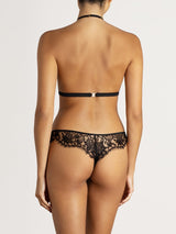Coco de Mer soft cup bra and skirted thong in delicate Leaver's lace with intricate floral detailing, shown on model