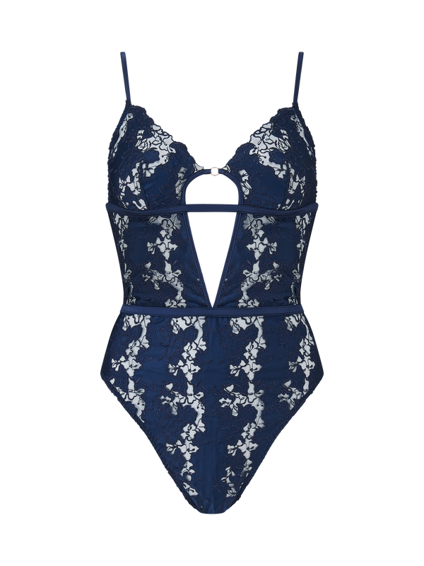A deep navy blue bodysuit with white floral embroidery, designed with a soft cup shape, silk bands, and a teardrop cut-out at the chest.