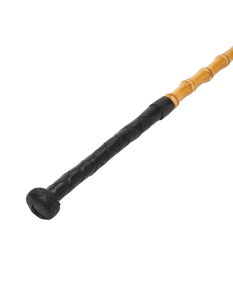 Coco de Mer's natural bamboo cane with black leather handle
