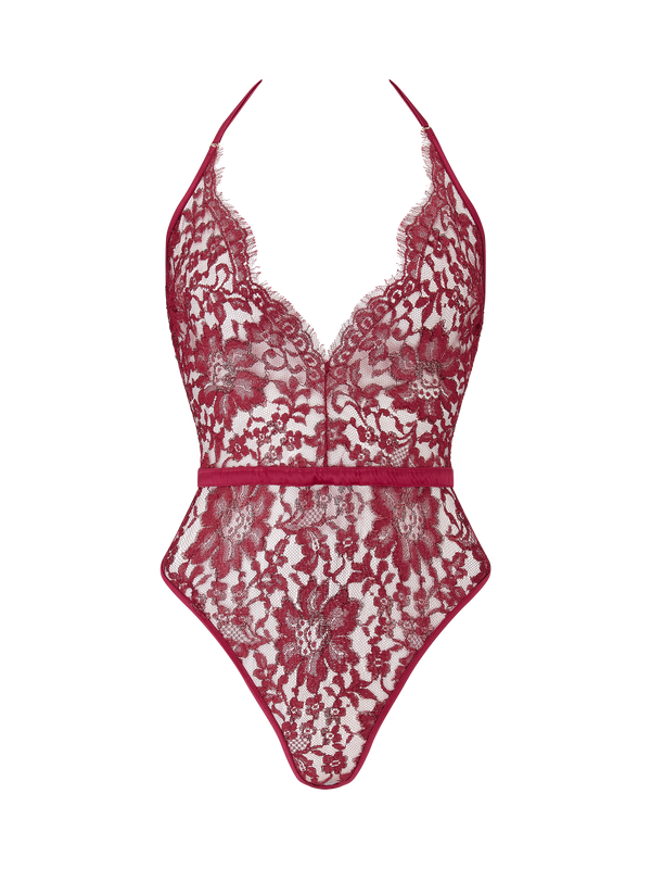 A red lurex Leaver's lace playsuit with a halterneck shape, delicate eyelash trim at the bust, and a silk band at the waist. It includes sleek adjustable silk straps and delicate golden hardware.