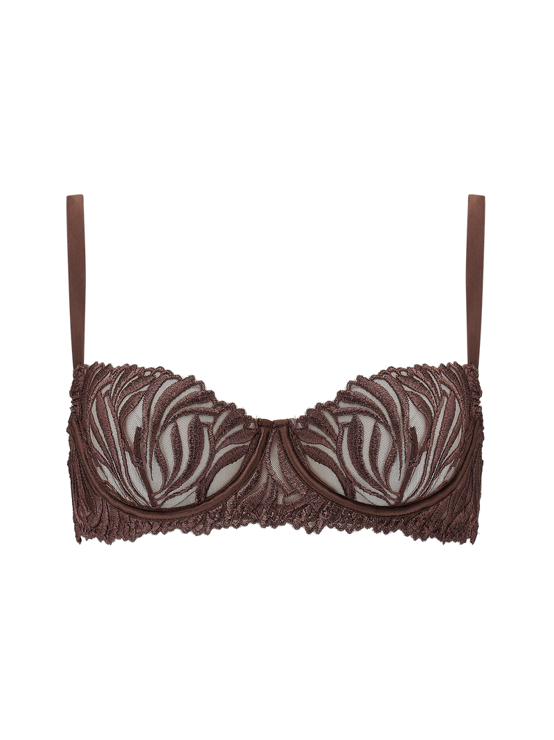 A brown Coco de Mer Tamia Balcony Bra with mocha embroidery, chocolate silk binding, and adjustable straps.