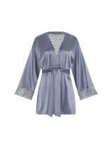 Front image of a Coco de mer robe. Powder blue silk with a geometric floral embroidery insert at the back and cuff. 