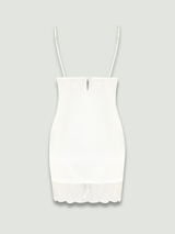 Back cut out image of the ivory silk slip with sheer scallop edge embroidery over the chest and scallop edge embroidery bottom edge detailing 