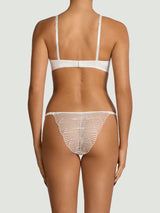 Model wears Ivory Brazilian knicker scallop edge embroidered with balcony bra 