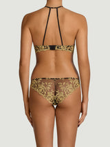 Model wears size M in black underwire plunge bra with gold embroidery and matching Brazilian black knickers with gold embroidery 