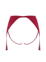 An intricate red French Leaver's lace and luxurious silk suspender knicker with a high waist and adjustable straps, featuring golden hardware and scallop edge lace details.A model wearing an intricate red French Leaver's lace and luxurious silk suspender knicker with a high waist and adjustable straps, featuring golden hardware and scallop edge lace details.