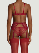 The back view of a red plunge bra made from a delicate French leaver's lace and silk. Scallop edges run across the neckline edge of the cups and at the under band. It is finished with red silk wire casing, adjustable straps and a hook and eye closure.