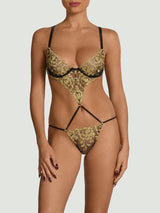 Model wears a UK size M in the black underwire playsuit with gold rose scallop edge embroidery detailing across the front with a closed cup bra 