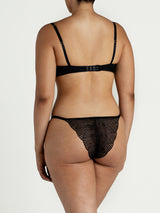 Athena Black Lace Balcony Bra & Brazilian Knicker shown on model from the back