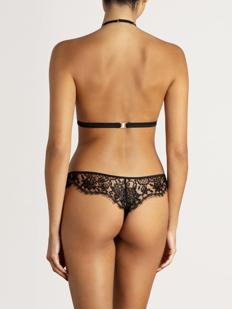 Coco de Mer soft cup bra and skirted thong in delicate Leaver's lace with intricate floral detailing, shown on model